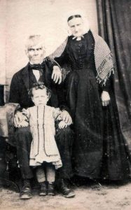 Ghostly Gazes: Unveiling Theories Around “A Family Photo, Late 1800s”