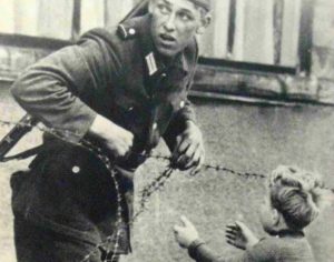 A Soldier, A Boy, And The Berlin Wall: The Touching Story Behind The Photo